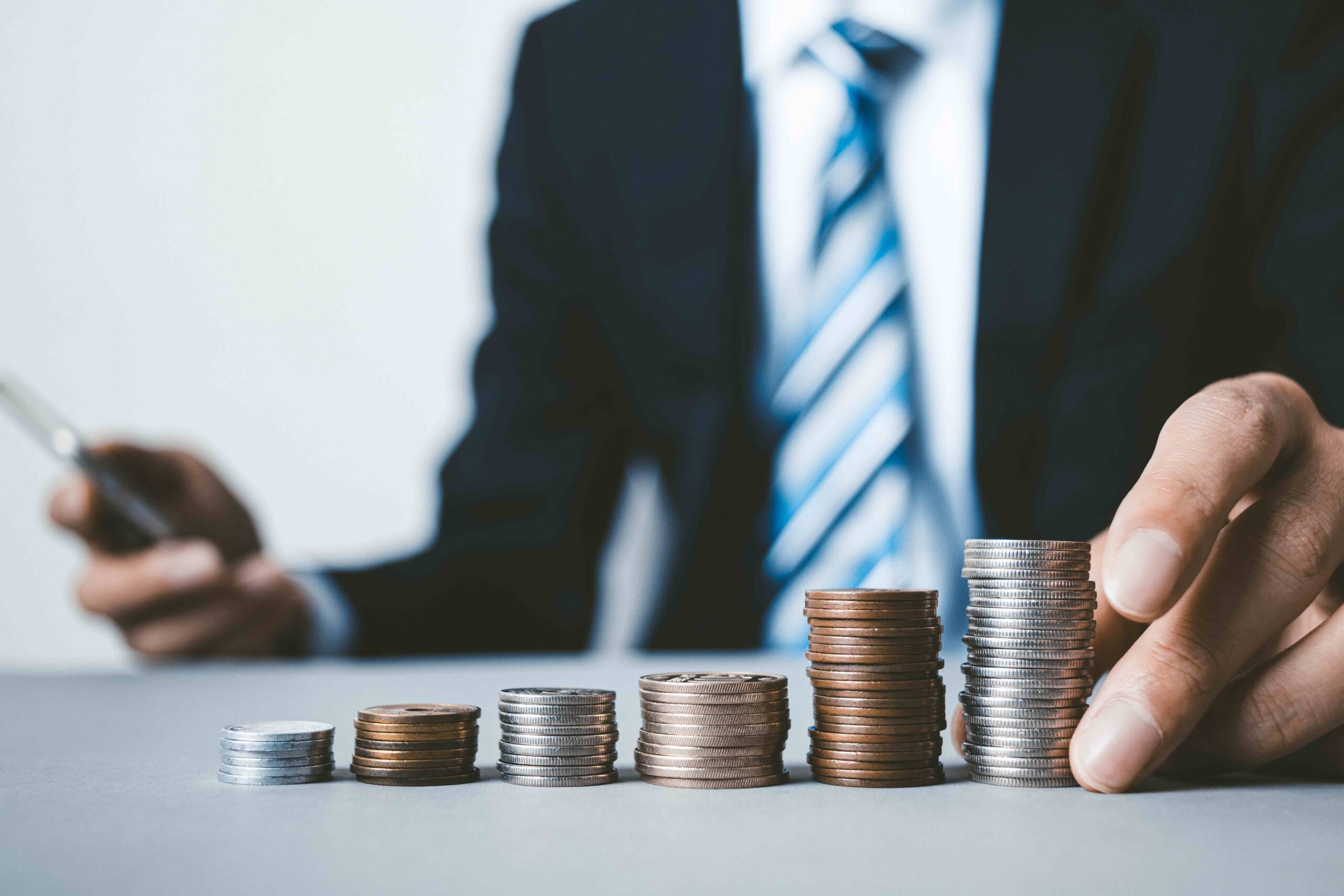Empilement de pièces symbolisant la croissance et la rentabilité d'une entreprise.